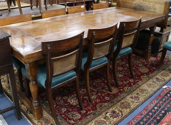 A 17th century style oak refectory table W.243cm.